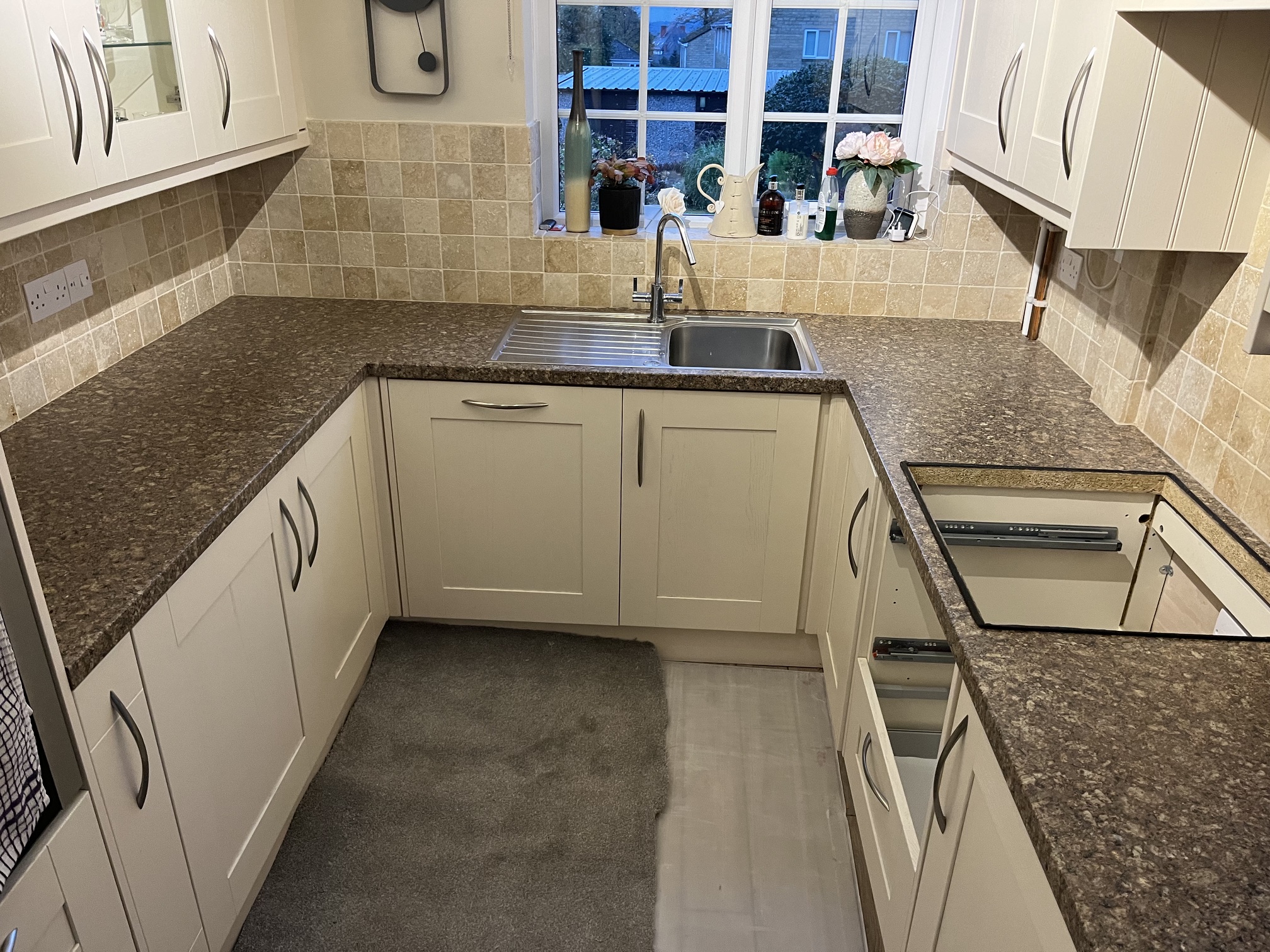 Original brown kitchen worktops before replacement in Huddersfield